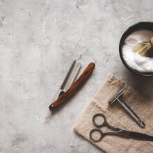 Mens hairdressing desktop with tools for shaving top view.